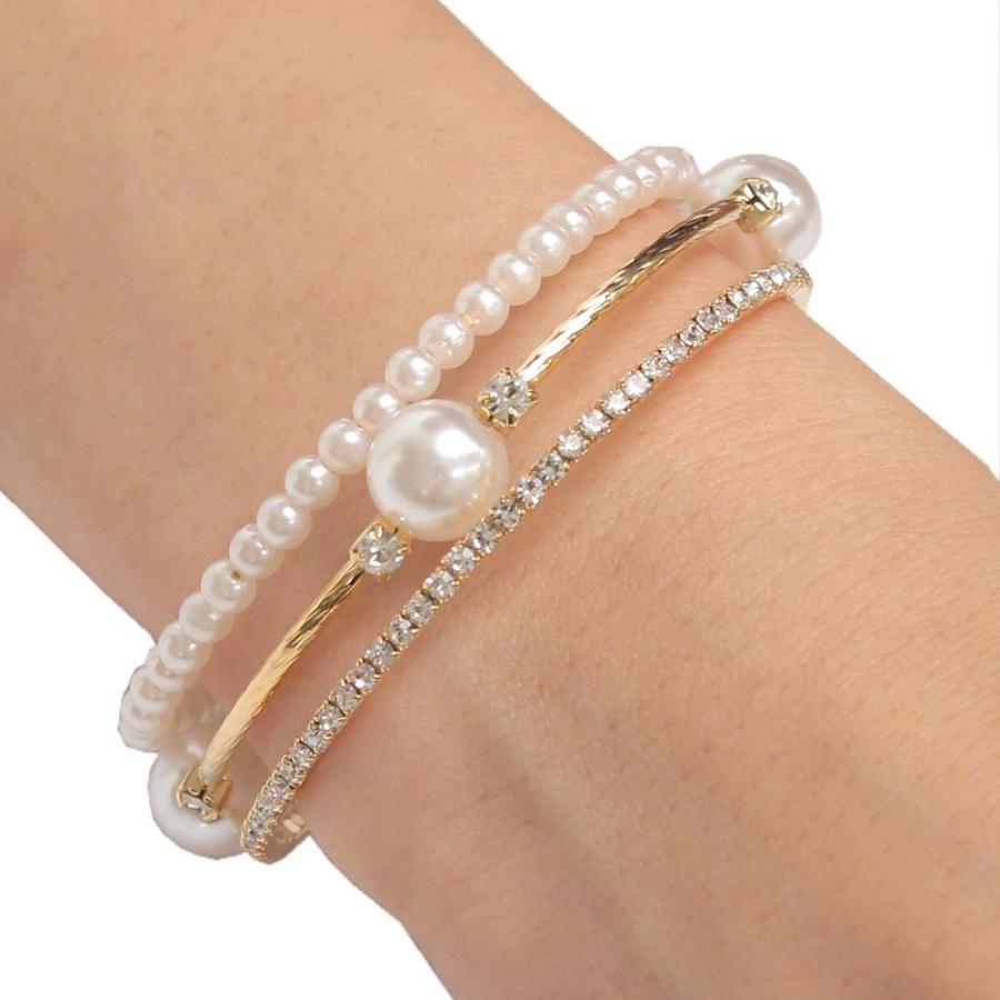 Triple-layered pearl and crystal cuff bracelet in gold and silver — stacked bangle design with rhinestones and faux pearls