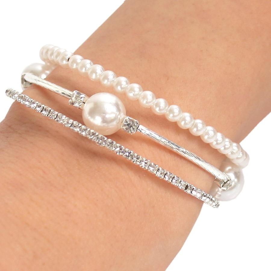 Triple-layered pearl and crystal cuff bracelet in gold and silver — stacked bangle design with rhinestones and faux pearls