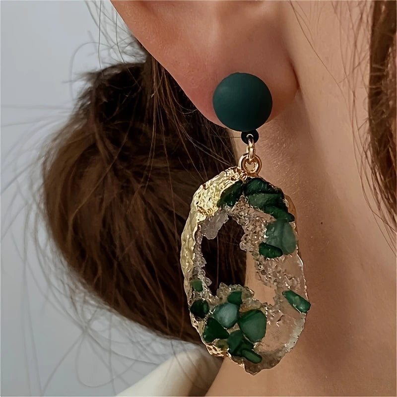 Emerald green geode-inspired drop earrings with gold-plated edges and matte forest green studs – bold resin statement jewelry for women