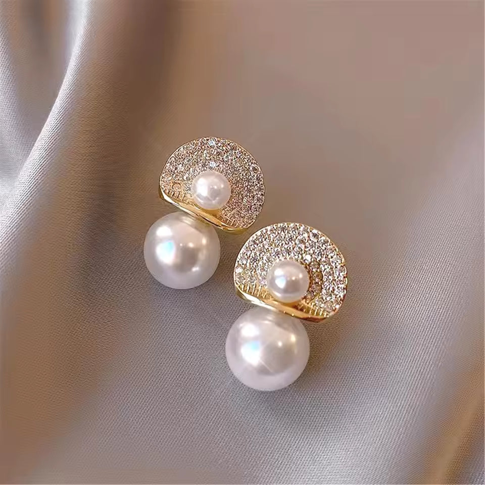 Gold and crystal pavé semi-circle earrings with two pearl drops – elegant statement jewelry for special occasions