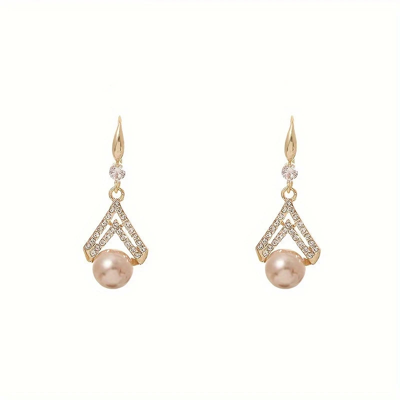 Champagne pearl drop earrings with gold V-shaped crystal detailing – elegant formal jewelry for women