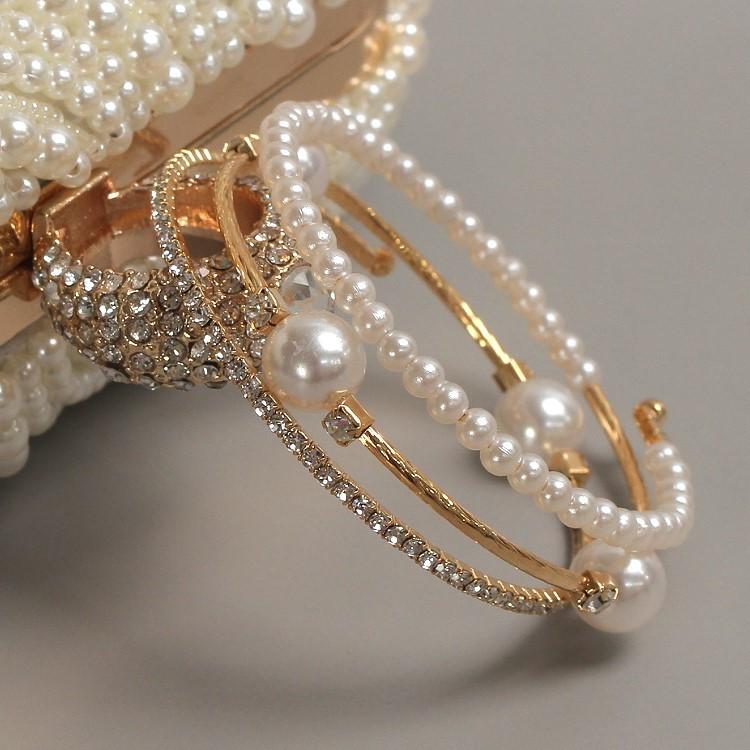 Triple-layered pearl and crystal cuff bracelet in gold and silver — stacked bangle design with rhinestones and faux pearls